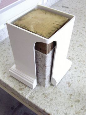 When wood posts must penetrate a roof deck, the flashing and roof covering are typically lapped up all four sides of the post and covered by a post sleeve.