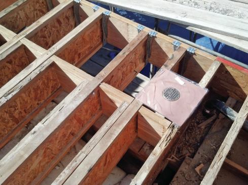 Thunderbird’s 4-inch deck drain, designed for membrane-type roof coverings, is attached to 16-gauge copper flashing.