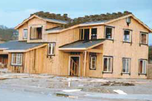 These photos were taken of two nearly identical houses in the same tract and illustrate how a change in the engineered plans can render a collector useless.