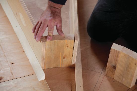 To cut and assemble the box pieces, I tack-nailed temporary stops along the front and rear offset lines on the winder template.