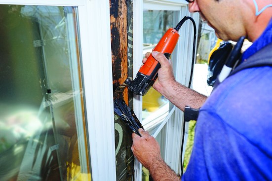 Next came the labor of removing existing peel-and-stick waterproof membrane, which turned out to go much faster with the help of an oscillating multi-tool. Replacing the old membrane with a new, breathable membrane (Henry Blueskin) would make the wall vapor-open as well as watertight. A new rainscreen, with an air space behind the new siding, would help the walls drain and dry when hit by wind-driven island rainstorms.