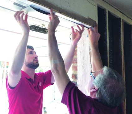 Site-bent coil stock was used at the head and sill of the openings to direct water out to the face of the exterior.