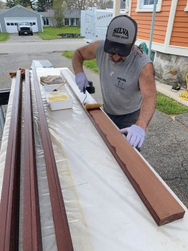 The author applied the penetrating oil finish with a roller, wiped it down after about 20 minutes, then allowed the finish to dry overnight before repeating the process.