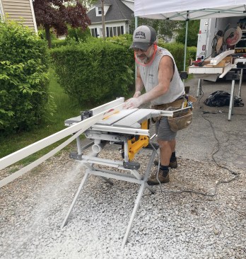 The author rips a 12-degree bevel on one of the PVC nailers.