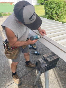 Once the balusters are tacked in position, Silva strengthens the connection with pairs of 1 1/2-inch trim screws.