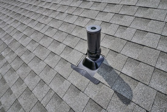 A ball-and-socket component on the Pivot Pipe boot flashing adjusts for roof pitch.