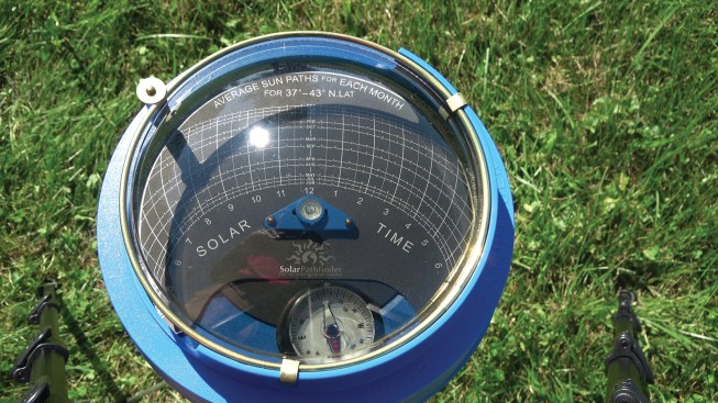 The Solar Pathfinder houses a sun-path diagram within a plastic dome. For a detailed description of its use, go to @EnergyUME on YouTube.